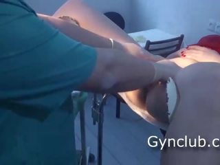 The young lady in the red dress at the gynecologist