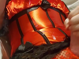 Crossdresser wanks and cums in red satin corset